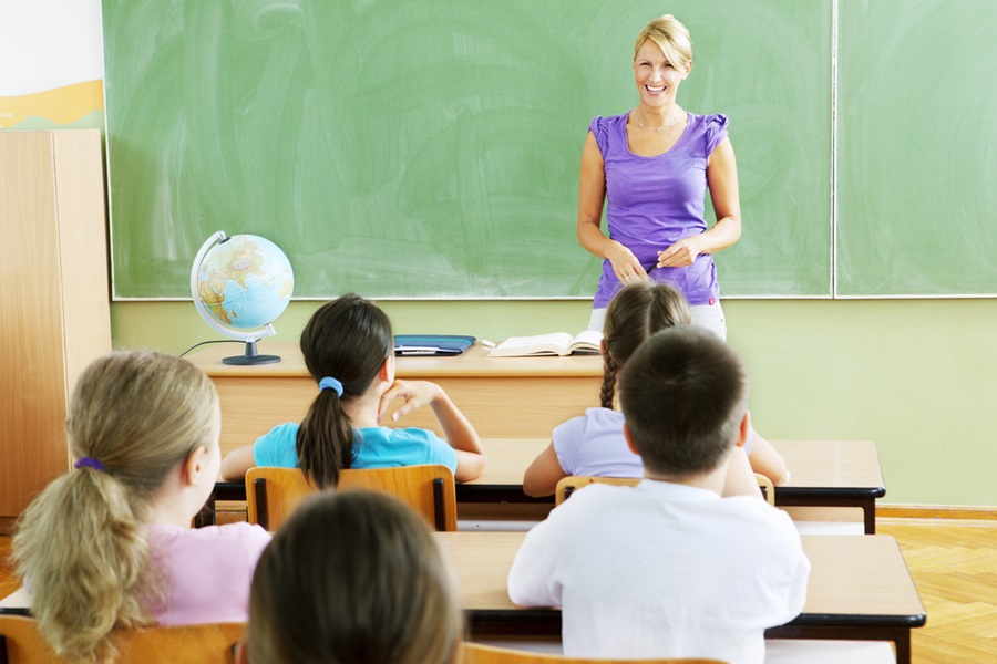 Female Teacher Questioning little students