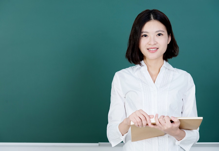 Female teacher in front 